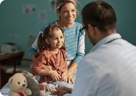 Mother and child consulting with a doctor